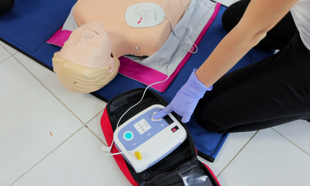 Visual representation of AEDs and manual defibrillators, highlighting the importance of rapid response to cardiac arrhythmias.