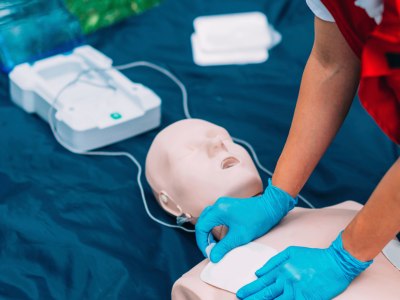 Healthcare professional reviewing ACLS kit documentation during a regulatory audit.