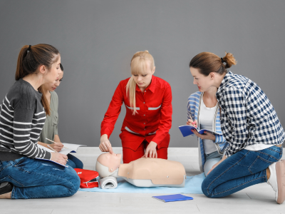 Healthcare practitioners engaged in ACLS team-based learning for effective emergency response.