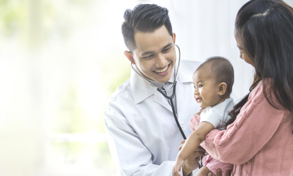 Confident provider offering pediatric care.