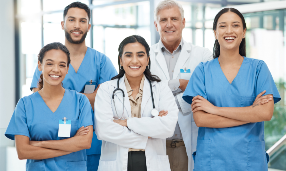 A collaborative session where professionals come together to discuss, strategize, and explain the ACLS step-by-step guide for certification.