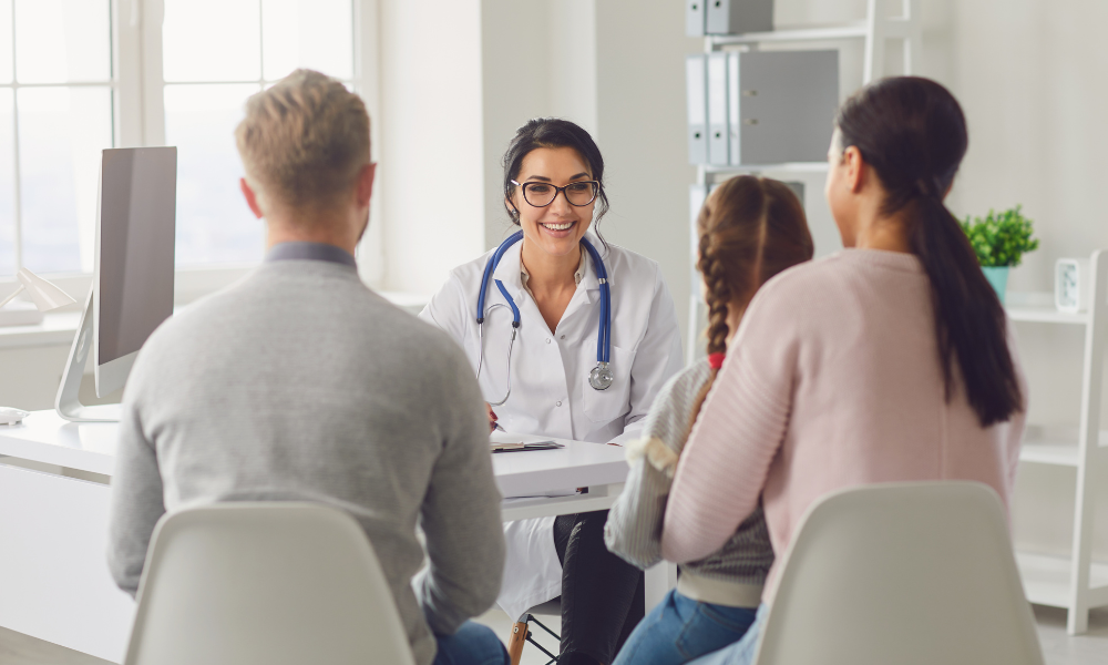 Healthcare provider providing emotional support to a child's family