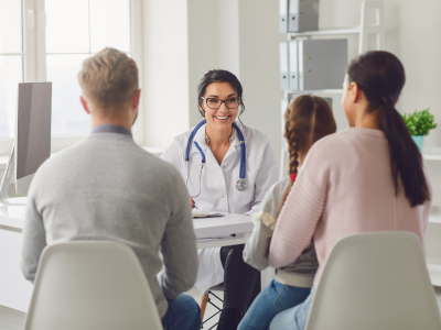 Healthcare provider providing emotional support to a child's family