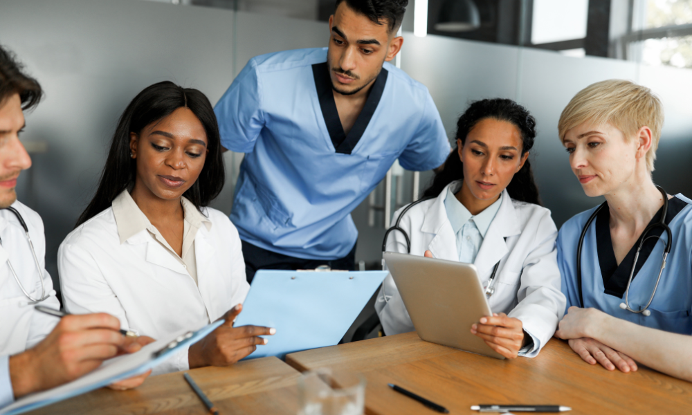 Instructor offering real-time feedback in healthcare training.