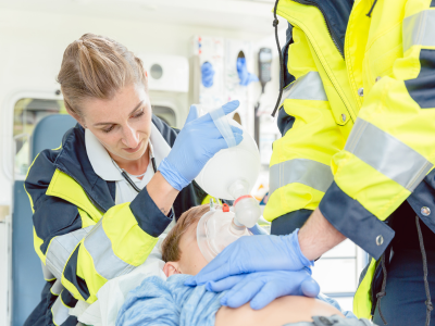 A dedicated healthcare professional exemplifying precise high-quality CPR during ACLS training.