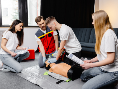 Healthcare professionals practicing high-quality CPR techniques for ACLS renewal.