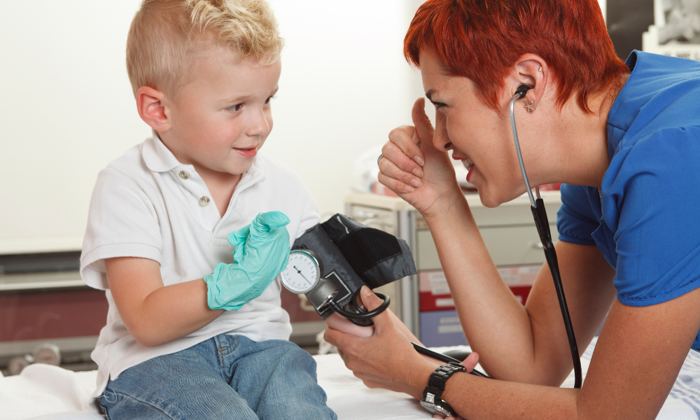 Healthcare provider administering medication to a child