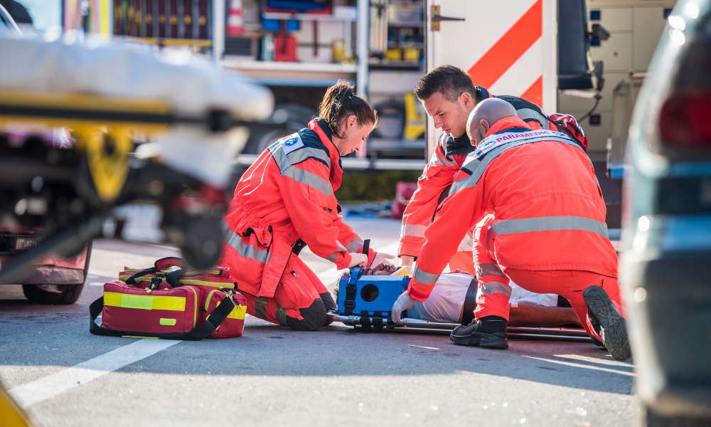 A First Aid certified individual confidently responding to an emergency.