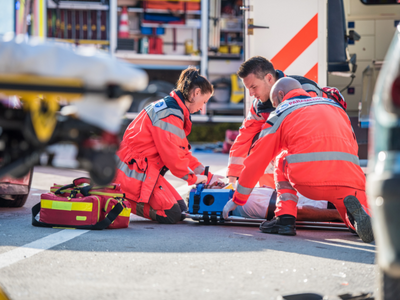 A First Aid certified individual confidently responding to an emergency.